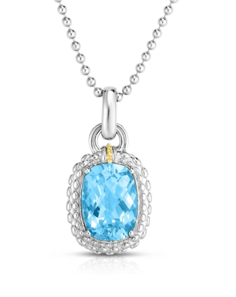 Sterling Silver and 18K Yellow Gold Blue Topaz Pendant.
